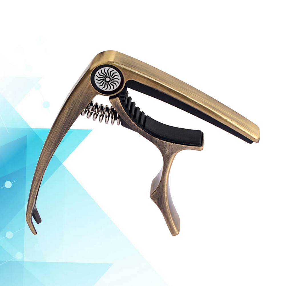 Gitaar Capo Clip-on Tuner Gun- - Guitar Capo Clip recensie en prijs