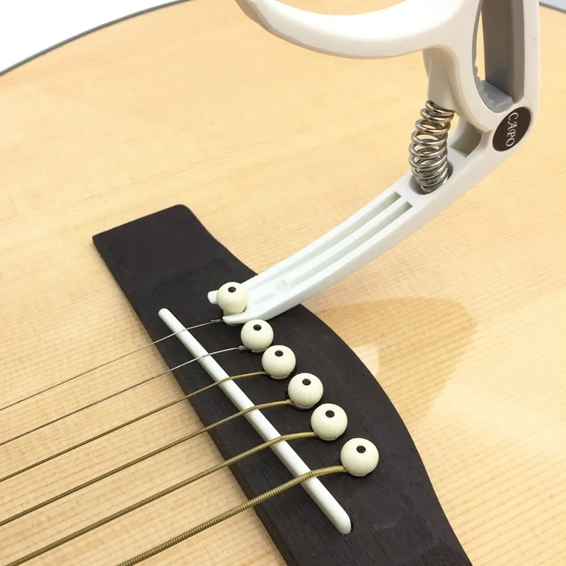Plastic Gitaar Capo voor 6-sna - Guitar Capo Clip recensie en prijs